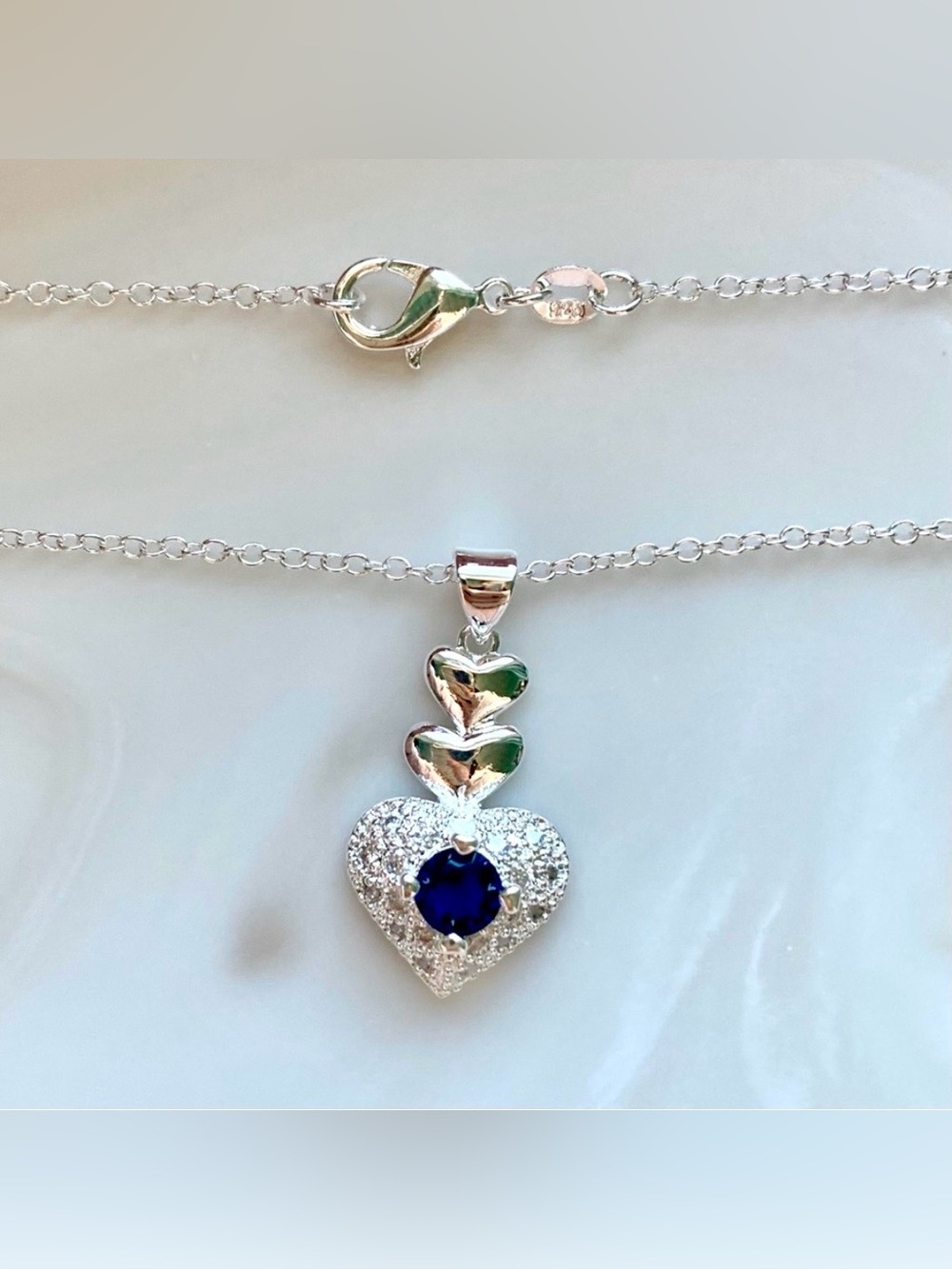 Silver Heart Pendant Necklace with Blue Center Stone